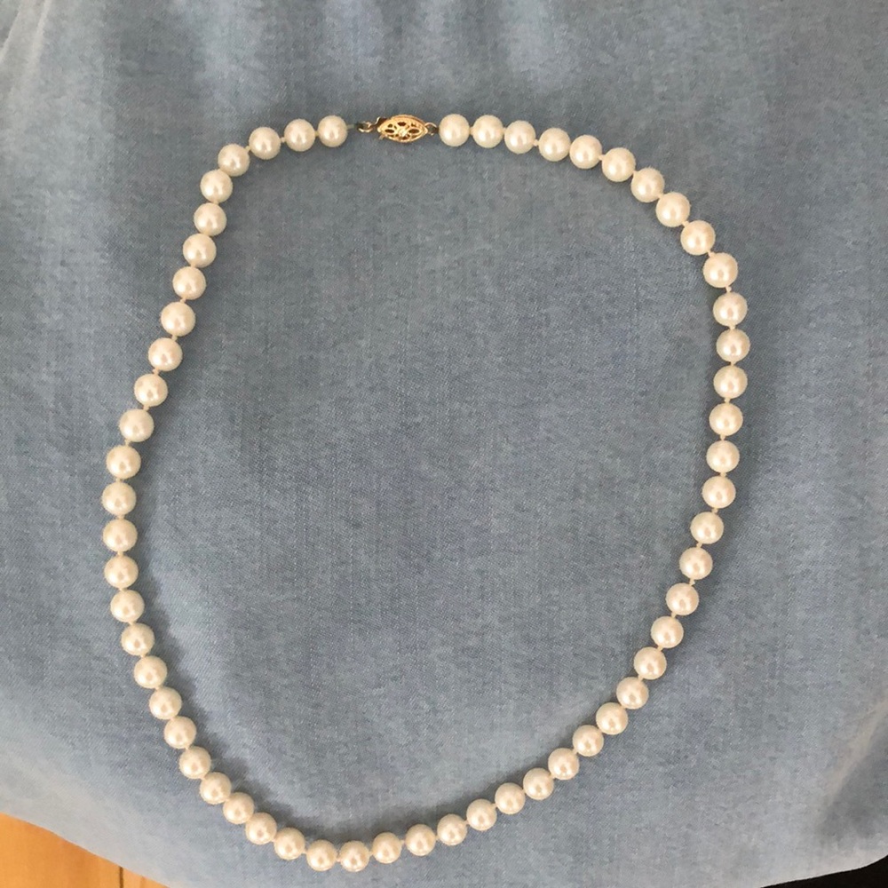 Real pearls with 14k gold clamps
